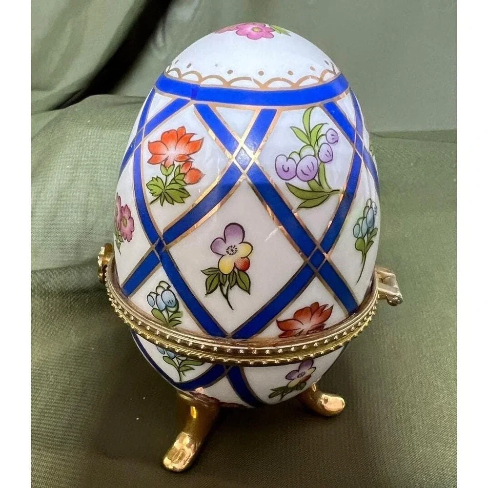 Vintage Fabergee egg inspired egg shape trinket box blue gold flowers